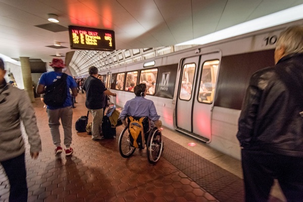 Photo: Wheelchair passenger and Metro train